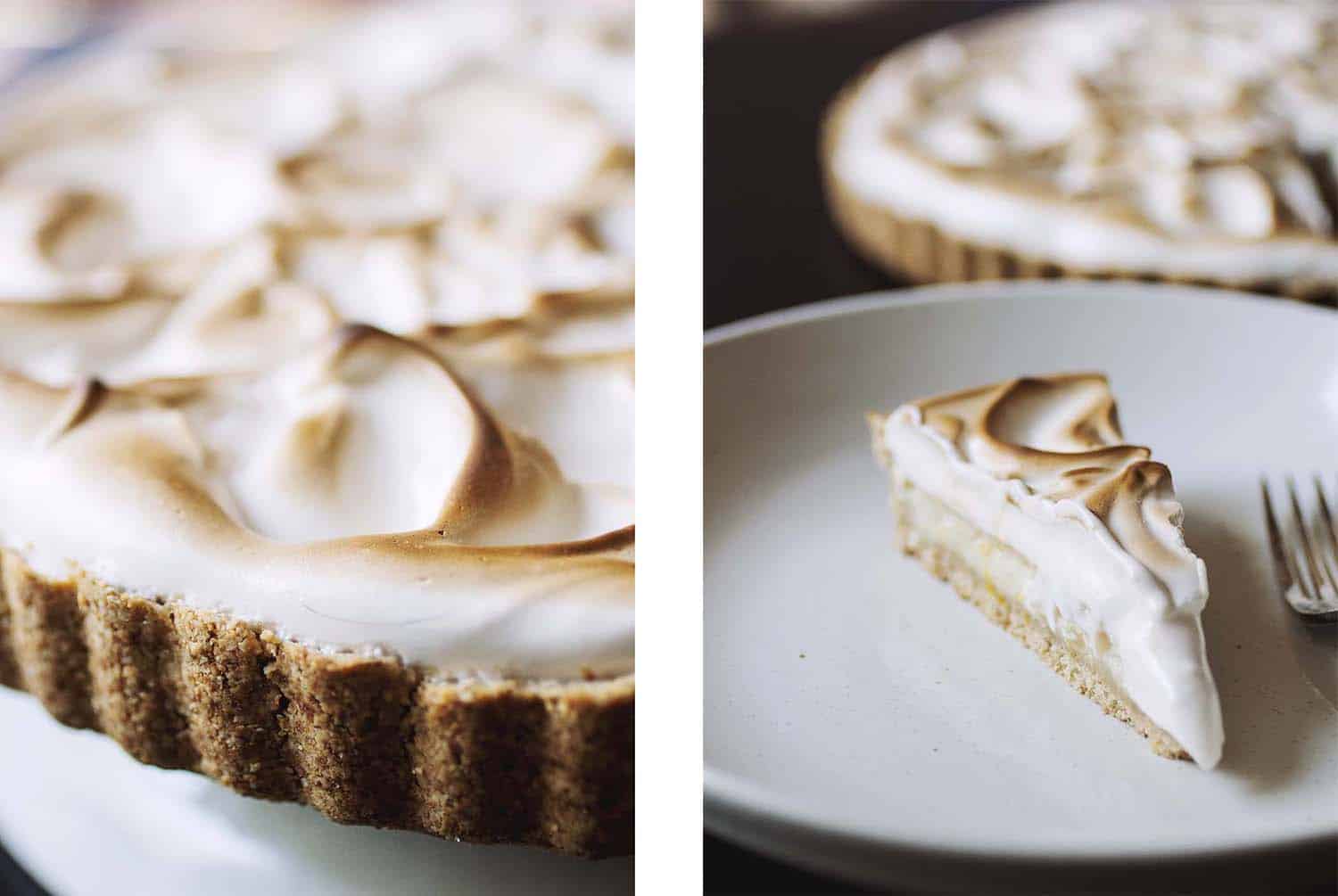 Close up on a toasted meringue lemon meringue tart next to a slice of tart on a white plate.