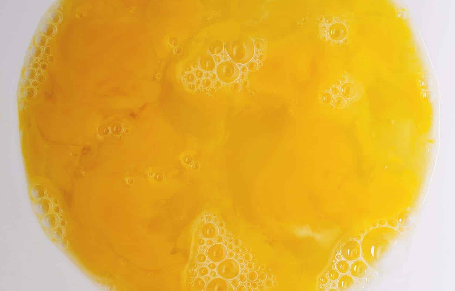 Close up on beaten eggs.