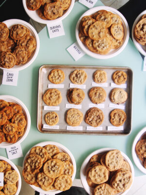 A tray of 12 different chocolate chip cookies.