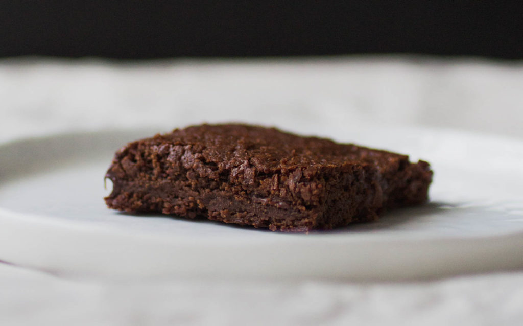 Ina Garten brownie on a white plate.