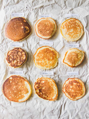 9 different pancakes on a gray background.