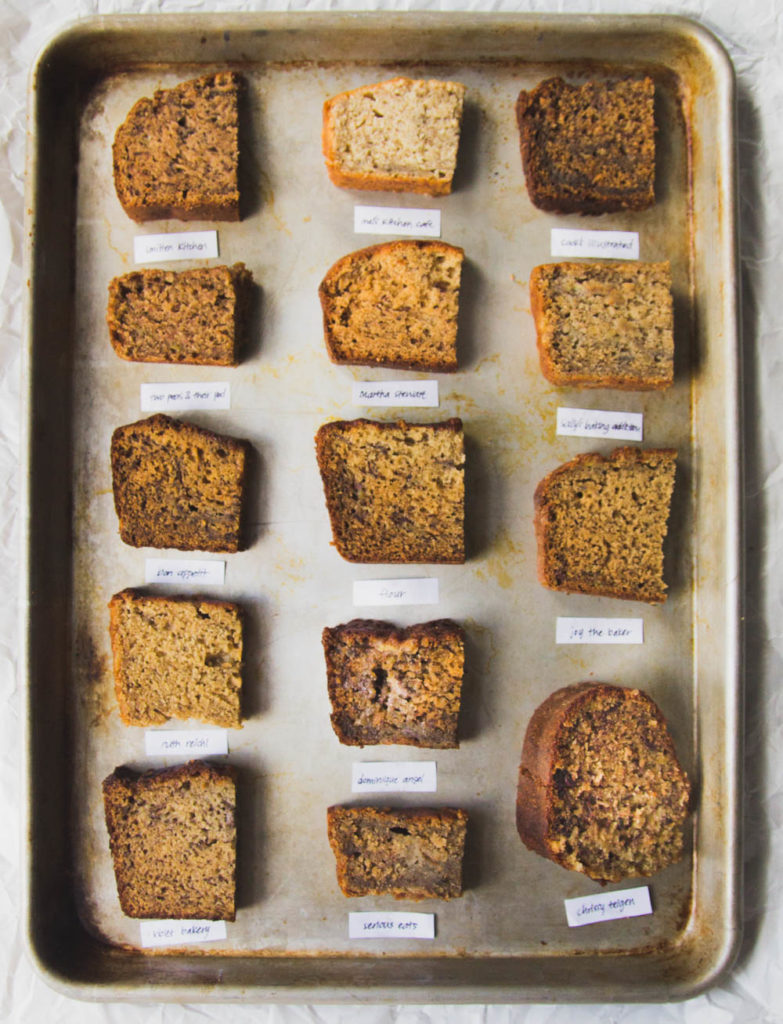 14 different slices of banana bread on a silver baking tray.