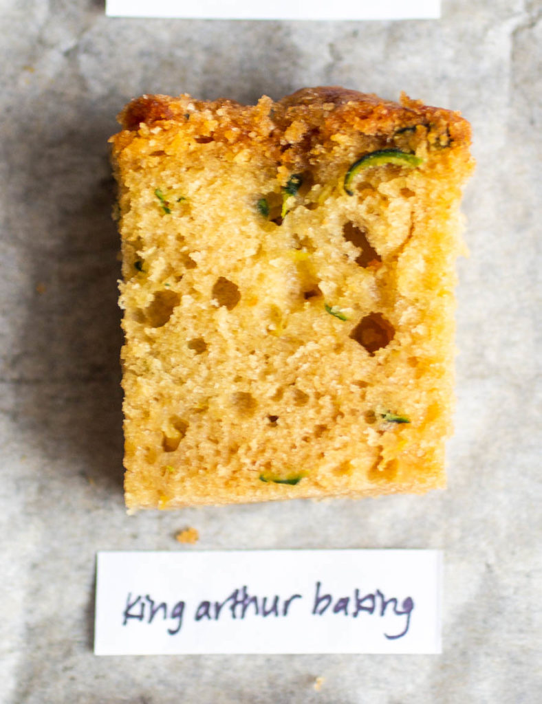 Overhead view of single slice of king arthur baking\'s zucchini bread recipe.