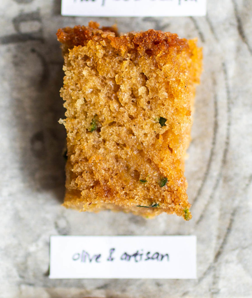 Olive and artisan zucchini bread recipe viewed from overhead.