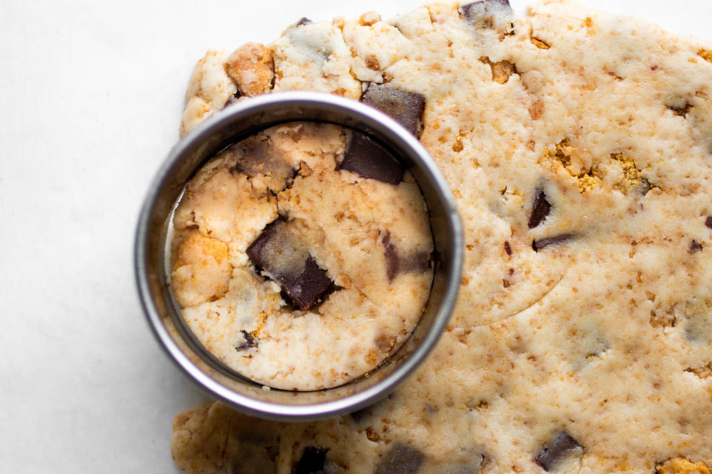 cookie dough with cookie cutter.