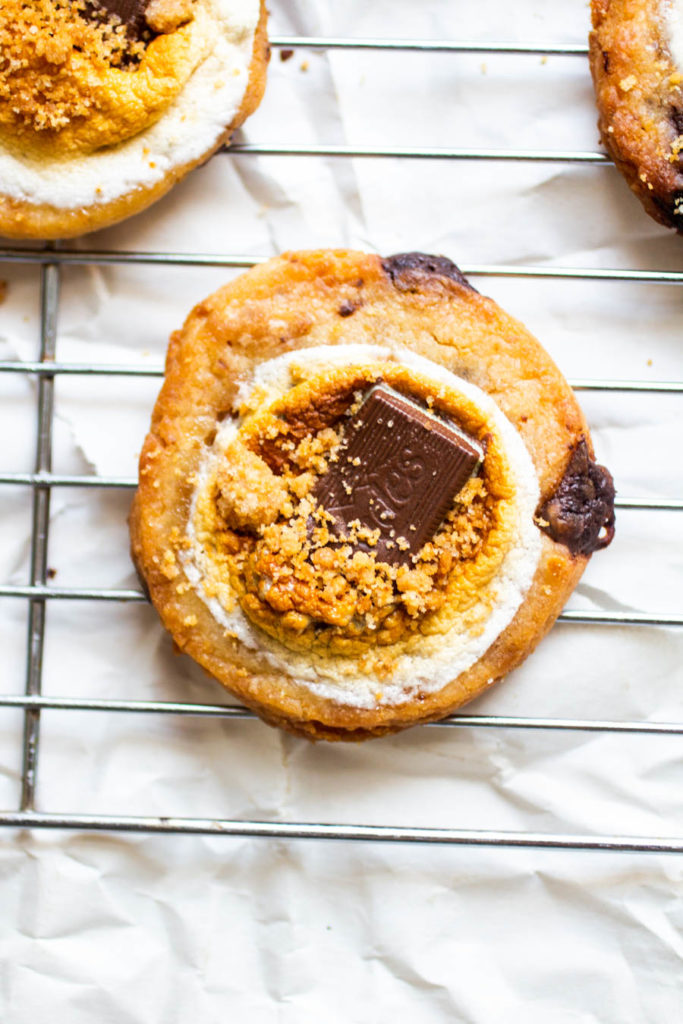 Close up of a s\'mores cookie on a cooling rack.