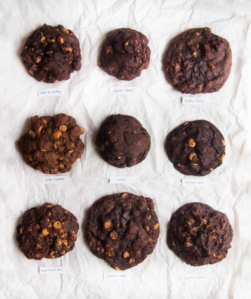 9 chocolate peanut butter chip cookies on a white background.