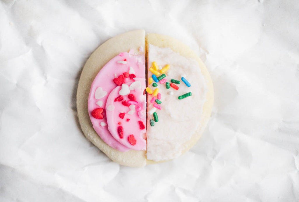 half lofthouse cookie pressed against half girl inspired lofthouse cookie.