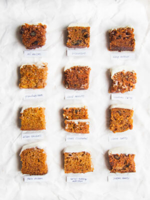 12 different slices of carrot cake on a white background.