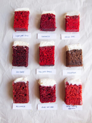9 squares of different red velvet cake on a white background.