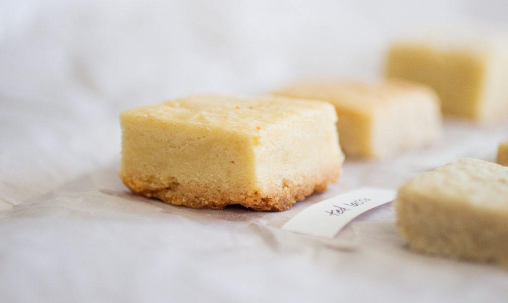 A close up of a square of shortbread.