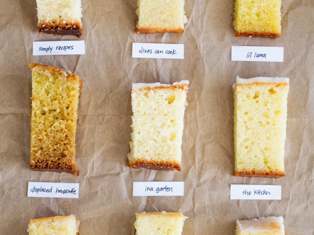 slices of glazed lemon cake laid out on a piece of crinkled brown paper.