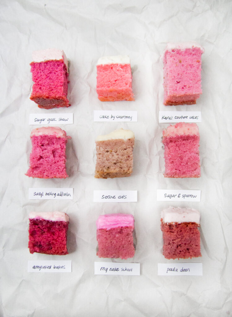 9 slices of iced strawberry cake recipes with the names of their creators below, lined on white parchment paper.