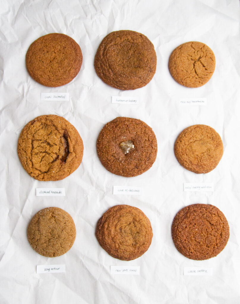 9 ginger molasses cookies on a white background.
