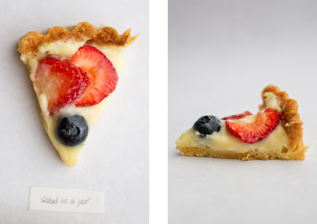 side by side shot of a slice of the salad in a jar fruit tart from the top next to the side view.