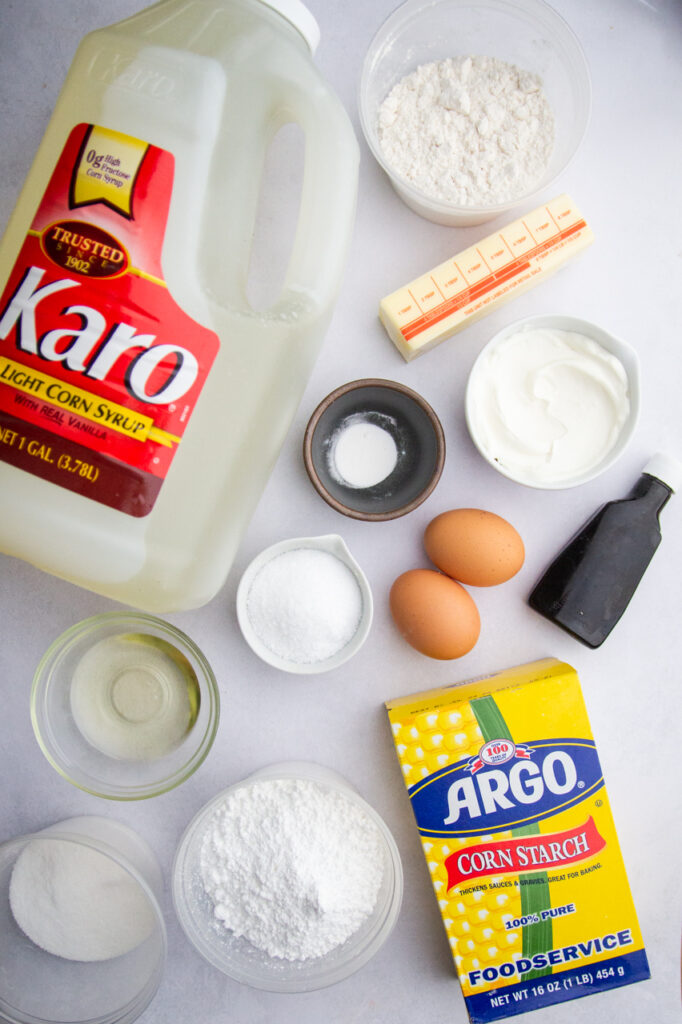 Ingredients for white Texas sheet cake: Karo corn syrup, cornstarch, butter, eggs, sugar, flour, oil, vanilla.