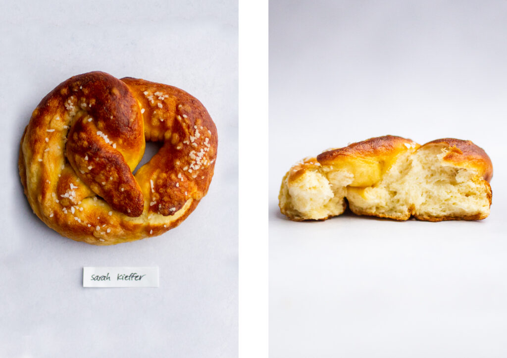 a soft pretzel labeled \"sarah kieffer\" next to a shot of the pretzel interior