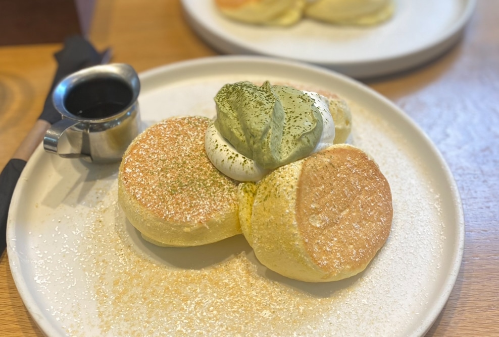 2 Japanese souffle pancakes on a white plate.