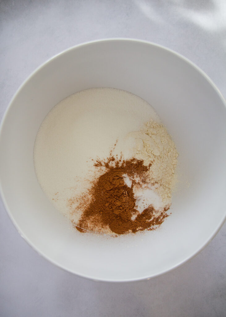 flour, sugar, salt and cinnamon in a mixing bowl.