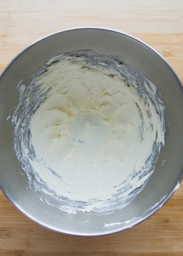 beaten cream cheese in a bowl.