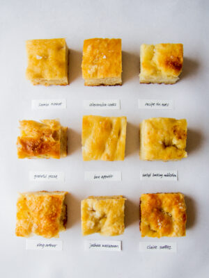 9 squares of focaccia with labels on a gray background.