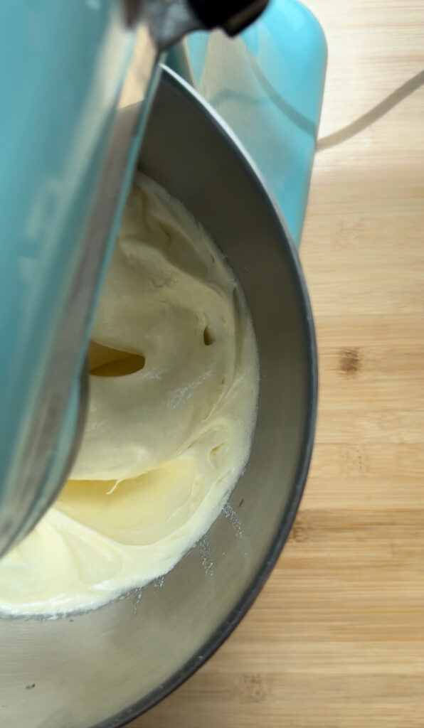 Whipped eggs and sugar in a stand mixer.
