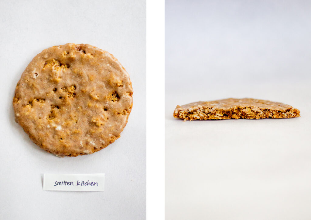 Smitten Kitchen\'s iced oatmeal cookie on a gray background.