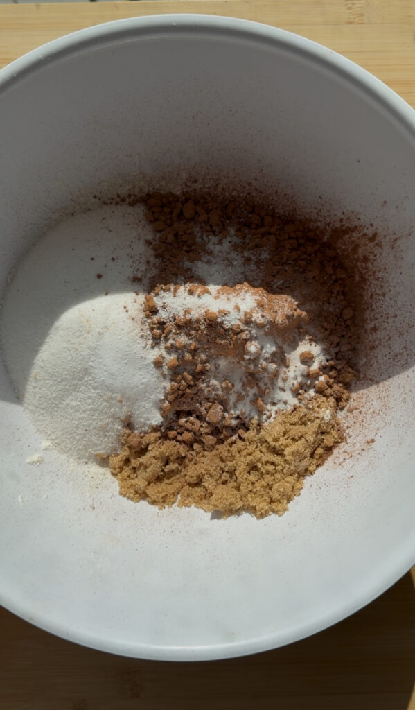 Dry ingredients in a white mixing bowl.