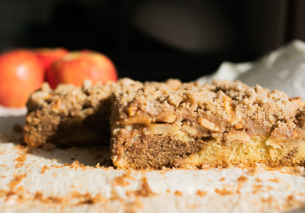 A sideways shot of the apple crumb cake to show the close crumb.