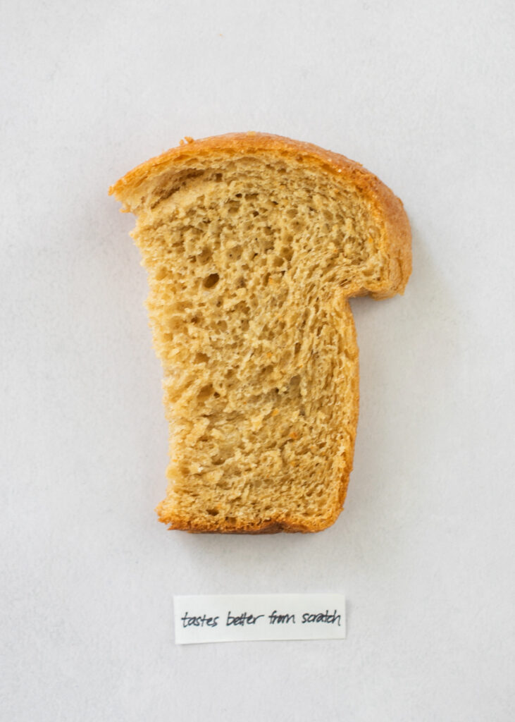 A slice of Tastes Better From Scratch whole wheat bread.